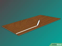 If you want to replace your kitchen floor or wall tiles without removing the cabinets, you'll need a power tool, such as an oscillating or rotary. How To Cut Laminate Flooring 6 Steps With Pictures Wikihow