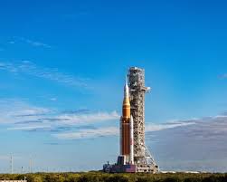 Nasa moon rocket creeps to its launchpad in preparation for astronaut flight