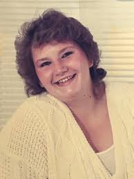 Can someone help edit a photo to remove the car from the background for an  obituary?