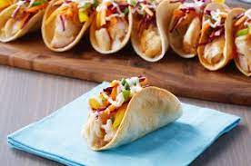 The cornmeal crust is crispy while the cod remains tender. Mini Tacos Au Poisson Recipes Cooking Recipes Cooking