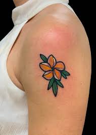 Flowers are probably the most common tattoo out there, and the most versatile! Plumeria By Adam Considine Tattoonow