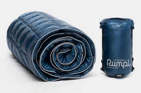 This fleece blanket is lightweight and compact. Rumpl Featherlite Down Blanket Clad