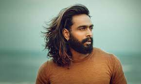Protective styles (and low manipulation looks) are ideal for afro hair care; 7 Ways To Take Care Of Your Long Hair As A Man