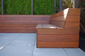 Building a bench or other seating into your landscape can help give a small space a cozy advantage. Kerasiotis Residence Built In Seating Backyard Seating Outdoor Bench Seating Diy Bench Outdoor