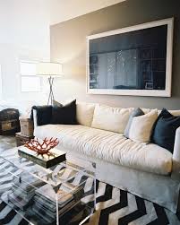 Among the most classic hollywood regency motifs are the wheat sheaf, the swan, and the ram (or ibex). Lucite Trunk Contemporary Living Room