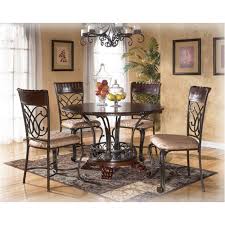 These pieces may feature wood or metal frames and a circular, square or rectangular surface. D345 15 Ashley Furniture Alyssa Round Dining Room Table