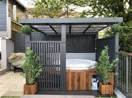 We are backed by a name with 40+ years of experience and offer complimentary design consultations. Modern Grey Pergola Lazy Spa Hot Tub Iroko Surround Hot Tub Backyard Hot Tub Gazebo Hot Tub Landscaping