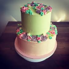 Buttercream flowers in pretty pastels create a garden of sweetness on this cake that's perfect for bridal showers, weddings, easter or mother's day. Jessicakes Pastel Floral 90th Birthday Cake Flavours Facebook
