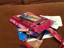 Then, use your sharp tool to poke a hole using the pattern sheet. Today S Hint Upcycle Your Old Wallet Cards Into A Toddler Wallet Toy Hint Mama