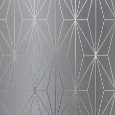 Wallpapers with a metallic sheen radiate with a captivating luxury. Kayla Metallic Geometric Wallpaper Fawn Silver Muriva 703011