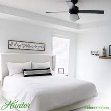 A Cozy Clean Bedroom Is What Every One Looks Forward To When They Arrive Home This White Bedroo Ceiling Fan Bedroom Living Room Ceiling Fan Best Ceiling Fans