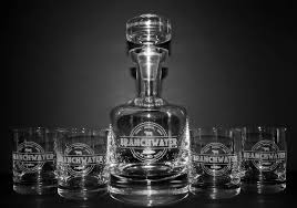 Perfect for whisky, scotch, & bourbon, a personalized whiskey decanter engraved with the phrase of your choice makes an excellent gift idea. Personalized Decanters W Custom Logo Engraving