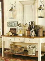 Many Beachy Accents At An Entryway Table Love The Lanterns Home Decor Beach House Decor Decor
