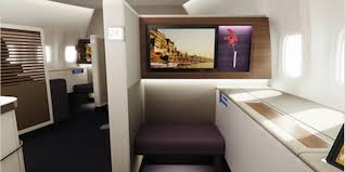 There's also an ottoman, though it's mostly only useful when you're trying to sleep, since it's otherwise too far away for most people to place their feet on. Thai Airways B747 400 Aircraft Interiors International