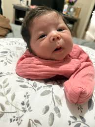 My baby sleeps a lot is this normal she's 1 month old she'll eat but  doesn't actually like wake up she just eats and stays asleep… she wakes up  fully maybe 3