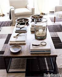 Designer Robert Stilin Decorated This Family Room Coffee Table With Elemental And Natural Objects Coffee Table Decorating Coffee Tables Coffee Table Styling