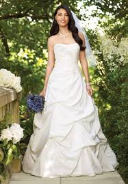 Even though most wedding dresses don't come with a bustle automatically, it's important to bustle a tuck the back of the skirt up and under your dress. Starting My Wedding Dress Noob Dressmaker