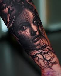 Tattoos by Mark Wosgerau added...