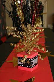 Roll out the red carpet for your party guests. Red Carpet Party Centerpieces Red Carpet Party Centerpieces Hollywood Party Decorations Hollywood Party Theme