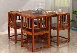 Its round shape and sleek wooden surface give it a welcoming and refreshing look. Pin On 4 Seater Dining Table Sets
