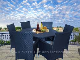 Round 6 seater outdoor dining table. Black Victoria 6 Seater Round Wicker Outdoor Dining Set