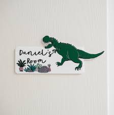 Personalised with their names and favourite colours for them. Personalised Dinosaur Bedroom Door Sign Plaque By Funky Laser Notonthehighstreet Com
