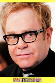 Seeing as everyone's posting pictures of when they met IT Crowd cast  members, I'd like to share this photo from when I met none other than Elton  John himself!