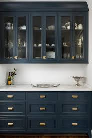 White kitchens repeatedly stand the test of time. Royal Blue Kitchen Cabinets Design Ideas