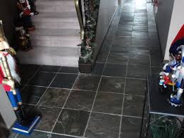 How To Install A Stone Tile Floor With Slate Stone Tile Flooring Stone Tile Flooring Flooring Slate Stone