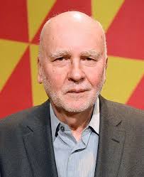 Tracht de verwonde wereld te bezingen