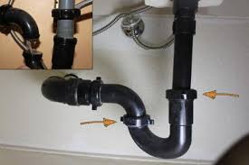 a bathroom sink drain with a snake