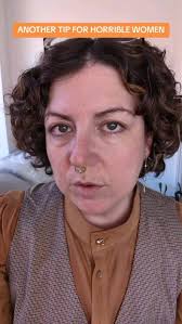 Stop trying to love the way you look, and start finding your joy in  tormenting men. It won't make you love yourself but it'll give you  something more rewarding to focus