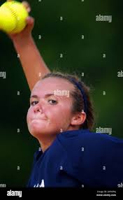 05/13/2005 Palm Harbor) Palm Harbor University High School pitcher Danielle  Hofer (cq from roster, #5, center) hi-fives her teammates after sliding to  second and being tagged out during the regional finals game