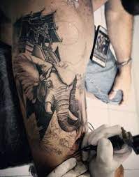 Asian Elephant In Temple Tattoo Guys Arm In 2021 Elephant Tattoo Design Tattoo Designs Men Elephant Tattoos