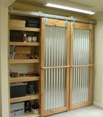Alder Corrugated Roofing And Heavy Duty Sliding Barn Door Track I M Liking This A Lot N Garage Storage Shelves Garage Storage Cabinets Diy Garage Storage