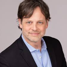 What is the best lens for Lumix GH5?