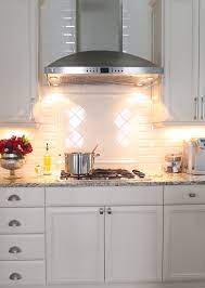 White kitchen backsplash ideas hood. Subway Tile Backsplash And Feature Design Under Hood Kitchen Design Small Kitchen Countertops Laminate Kitchen Design