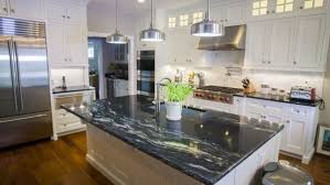 They contrast with the white cabinets. Black Granite Countertops Styles Tips Video Infographic