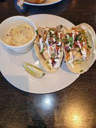Lightly drizzle fish with olive oil and top each piece with a dot of butter. Fish Tacos Picture Of Latitude Seafood Co Midlothian Tripadvisor