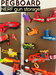 Have a bunch of nerf guns laying around and want to get them out of the way and also add an awesome nerf gun rack to your. Diy Pegboard Nerf Gun Storage Moments With Mandi
