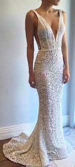 You order the dress as shown on photo, with long sleeves,with slit on the chest with lacing and gold sequins and beads embellishment, with front long slit on skirt from. New Arrival Wedding Dress Exquisite Deep V Neck Sweep Train Lace Backless Mermaid Weddin Mermaid Bride Dresses Wedding Dresses Backless Mermaid Wedding Dresses