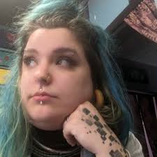 Skyler Cook (@necroglitter.tattoos)