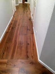 Actually i have a lot of questions, but i the house has a section of hallway that i am unsure how to orient the hardwood flooring in. Hardwood Laying Direction