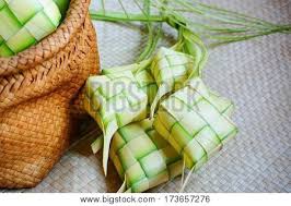 Light up this christmas and new year at anantara mui ne resort in a tropical and indigenous setting. Ketupat Rice Dumpling Is A Local Delicacy During The Festive Season In Malaysia On Traditional Mat Background Ketupat A Natural Rice Casing Made From Young Coconut Leaves For Cooking Rice Stock