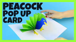 Glue the card stock to the construction paper. Peacock Diy Pop Up Card Paper Crafts For Kids Youtube