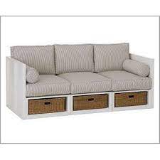 A Great Idea Even Have The Couch Built Higher Than Normal So You Can Have Pull Out Ottomans Instead Of Baskets Whic Sofa Storage Built In Couch Couch Storage