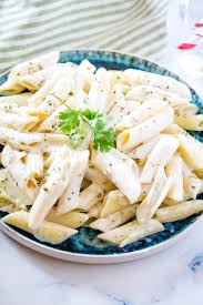 A creamy cheese and garlic blend for a gluten free pasta dish bursting with flavor. Creamy Garlic Pasta I Knead To Eat