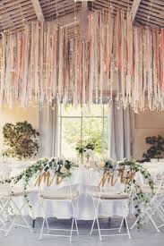 Style Me Pretty The Vault Wedding Chandelier Rustic Summer Wedding Wedding Backdrop Lights