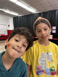 RCK Holds Student Art Show Ruth C. Kinney Elementary School held an art  show last month, displaying work from all the school's students. The event  also featured face painting and crafts in