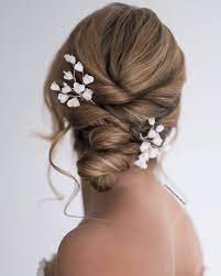 V I V I E M B E L L I S H On Instagram The Aiyanna Hair Pins In This Gorge Twisty Updo Flower Hair Accessories Wedding Low Bun Bridal Hair Bridal Hair Updo